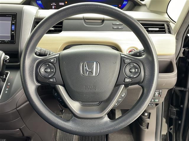 フリード Ｇ・ホンダセンシング　４ＷＤ　寒冷地　ホンダセンシング　アダプティブクルーズコントロール　横滑り防止装置　レーンキープアシスト　純正ナビ　バックカメラ　純正フリップダウンモニター　両側パワースライドドア　前席シートヒーター（9枚目）