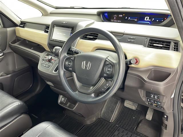 フリード Ｇ・ホンダセンシング　４ＷＤ　寒冷地　ホンダセンシング　アダプティブクルーズコントロール　横滑り防止装置　レーンキープアシスト　純正ナビ　バックカメラ　純正フリップダウンモニター　両側パワースライドドア　前席シートヒーター（20枚目）