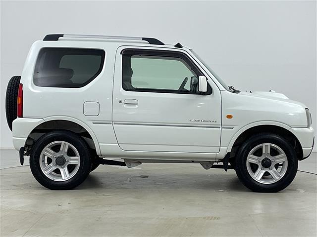 ジムニー ランドベンチャー　４ＷＤ　社外ナビ（ＭＡＸ５００）　ＣＤ／ワンセグＴＶ　ハーフレザーシート　Ｄ席シートヒーター　ルーフレール　社外ＬＥＤヘッドライト　ドアミラーヒーター（33枚目）