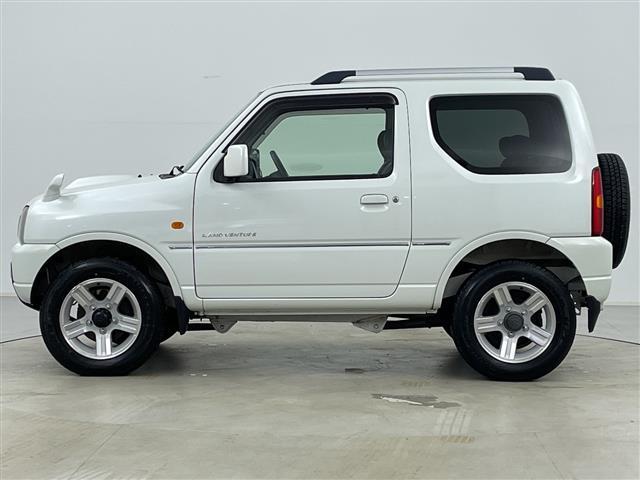 ジムニー ランドベンチャー　４ＷＤ　社外ナビ（ＭＡＸ５００）　ＣＤ／ワンセグＴＶ　ハーフレザーシート　Ｄ席シートヒーター　ルーフレール　社外ＬＥＤヘッドライト　ドアミラーヒーター（34枚目）