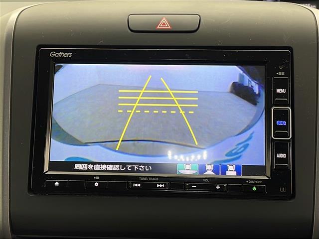 フリードハイブリッド ハイブリッド・クロスターホンダセンシング　４ＷＤ　社外ＳＤナビ　Ｂｌｕｅｔｏｏｔｈ　ＣＤ　ＤＶＤ　フルセグ　バックカメラ　ビルトインＥＴＣ　クルーズコントロール　車線逸脱警報　後方コーナーセンサー　両側パワースライドドア　純正ＡＷ　サンシェー（2枚目）