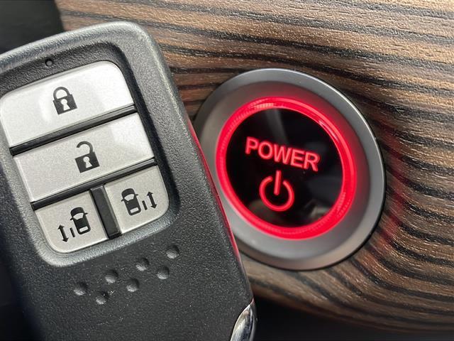 フリードハイブリッド ハイブリッド・クロスターホンダセンシング　４ＷＤ　社外ＳＤナビ　Ｂｌｕｅｔｏｏｔｈ　ＣＤ　ＤＶＤ　フルセグ　バックカメラ　ビルトインＥＴＣ　クルーズコントロール　車線逸脱警報　後方コーナーセンサー　両側パワースライドドア　純正ＡＷ　サンシェー（18枚目）