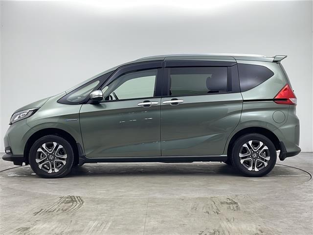 フリードハイブリッド ハイブリッド・クロスターホンダセンシング　４ＷＤ　社外ＳＤナビ　Ｂｌｕｅｔｏｏｔｈ　ＣＤ　ＤＶＤ　フルセグ　バックカメラ　ビルトインＥＴＣ　クルーズコントロール　車線逸脱警報　後方コーナーセンサー　両側パワースライドドア　純正ＡＷ　サンシェー（35枚目）