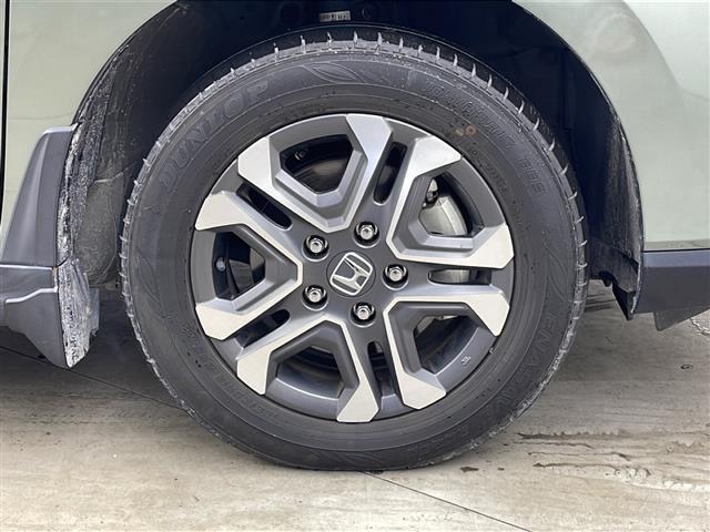 フリードハイブリッド ハイブリッド・クロスターホンダセンシング　４ＷＤ　社外ＳＤナビ　Ｂｌｕｅｔｏｏｔｈ　ＣＤ　ＤＶＤ　フルセグ　バックカメラ　ビルトインＥＴＣ　クルーズコントロール　車線逸脱警報　後方コーナーセンサー　両側パワースライドドア　純正ＡＷ　サンシェー（37枚目）