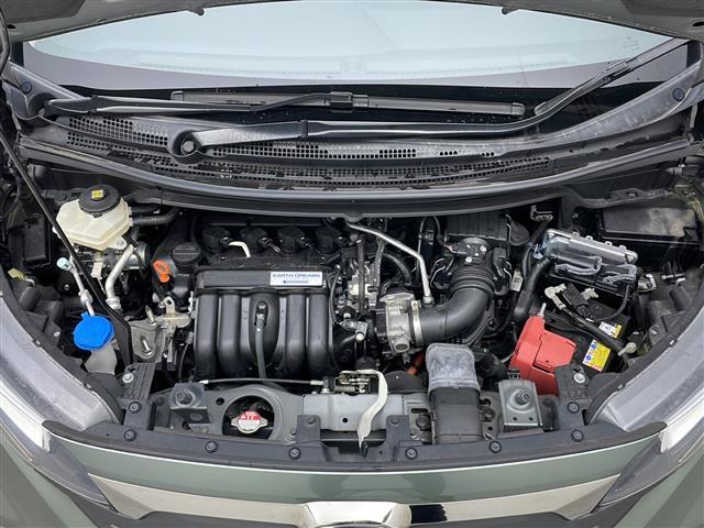 フリードハイブリッド ハイブリッド・クロスターホンダセンシング　４ＷＤ　社外ＳＤナビ　Ｂｌｕｅｔｏｏｔｈ　ＣＤ　ＤＶＤ　フルセグ　バックカメラ　ビルトインＥＴＣ　クルーズコントロール　車線逸脱警報　後方コーナーセンサー　両側パワースライドドア　純正ＡＷ　サンシェー（40枚目）