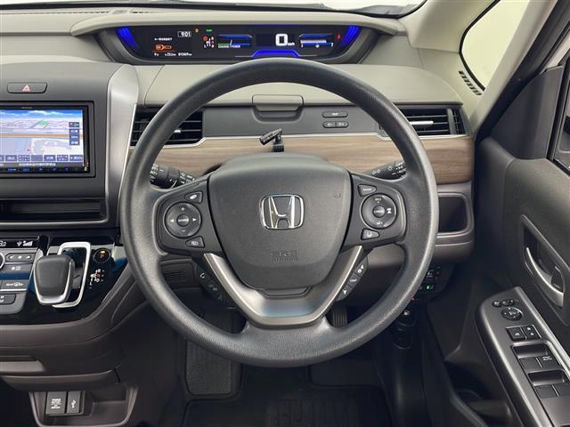 フリードハイブリッド ハイブリッド・Ｇ　禁煙車　ホンダセンシング　社外メモリナビ　バックカメラ　両側パワースライドドア　レーダークルーズコントロール　ＬＥＤオートライト　前席シートヒーター　純正ホイールキャップ　ＵＳＢ　スマートキー　ＥＴＣ（8枚目）