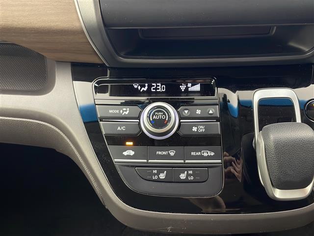 フリードハイブリッド ハイブリッド・Ｇ　禁煙車　ホンダセンシング　社外メモリナビ　バックカメラ　両側パワースライドドア　レーダークルーズコントロール　ＬＥＤオートライト　前席シートヒーター　純正ホイールキャップ　ＵＳＢ　スマートキー　ＥＴＣ（16枚目）