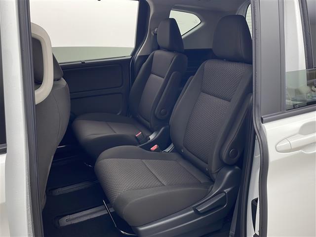 フリードハイブリッド ハイブリッド・Ｇ　禁煙車　ホンダセンシング　社外メモリナビ　バックカメラ　両側パワースライドドア　レーダークルーズコントロール　ＬＥＤオートライト　前席シートヒーター　純正ホイールキャップ　ＵＳＢ　スマートキー　ＥＴＣ（26枚目）