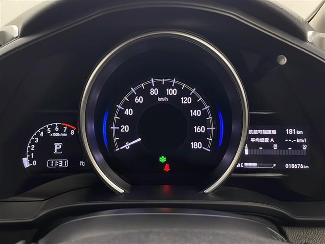 フィット １３Ｇ・Ｌ　ホンダセンシング　禁煙車　ホンダセンシング　純正ＳＤナビ　バックカメラ　レーダークルーズコントロール　ＬＥＤオートライト　アイドリングストップ　レーンキープアシスト　ステアリングスイッチ　スマートキー　ビルトインＥＴＣ（12枚目）