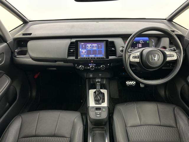 フィット e:HEVリュクス 純正8型ナビ(CD DVD BT フルセグTV) バックカメラ ETC シティブレーキシステム レーンキープアシスト オートハイビーム レーダークルーズコントロール コーナーセンサー(2枚目)