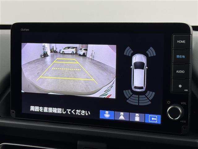 フリード ｅ：ＨＥＶクロスター　登録済未使用車　純正ナビ／フルセグＴＶ　バックカメラ　アダプティブクルコン　コーナーセンサー　衝突軽減　レーンキープ　アクセル踏み間違い防止　ＢＳＭ　両側電動スライドドア　シートヒーター　ＬＥＤライト（5枚目）