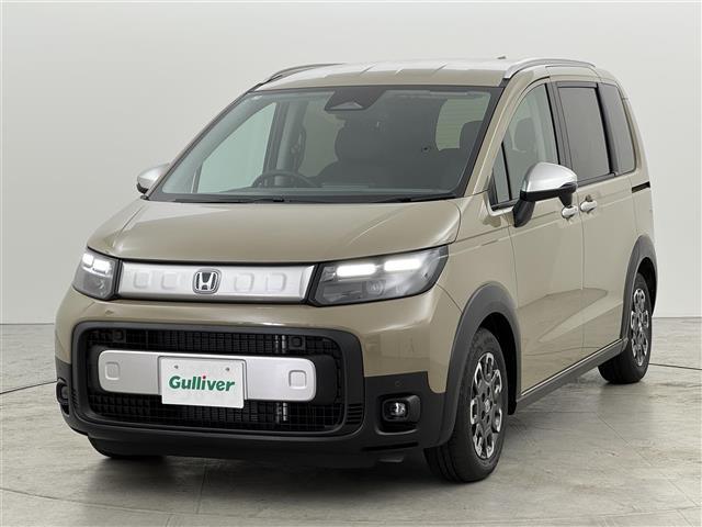 フリード ｅ：ＨＥＶクロスター　登録済未使用車　純正ナビ／フルセグＴＶ　バックカメラ　アダプティブクルコン　コーナーセンサー　衝突軽減　レーンキープ　アクセル踏み間違い防止　ＢＳＭ　両側電動スライドドア　シートヒーター　ＬＥＤライト（19枚目）