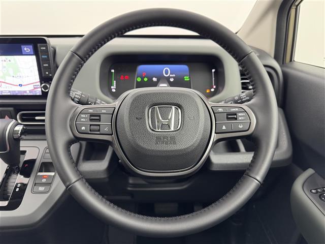 フリード ｅ：ＨＥＶクロスター　登録済未使用車　純正ナビ／フルセグＴＶ　バックカメラ　アダプティブクルコン　コーナーセンサー　衝突軽減　レーンキープ　アクセル踏み間違い防止　ＢＳＭ　両側電動スライドドア　シートヒーター　ＬＥＤライト（23枚目）