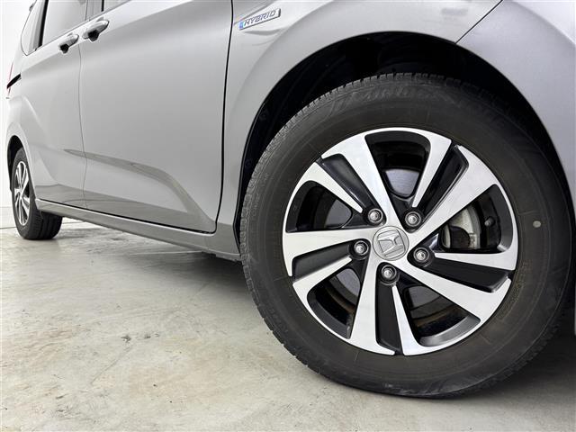 フリードハイブリッド ハイブリッド・ＥＸ　純正ナビ／フルセグＴＶ／ＢＴ　ビルトインＥＴＣ　ドライブレコーダー　バックカメラ　両側パワースライドドア　クルーズコントロール　衝突被害軽減システム　レーンキープ　コーナーセンサー　シートヒーター（18枚目）