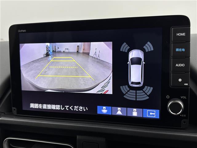 フリード ｅ：ＨＥＶクロスター　登録済未使用車　純正９型ナビ／フルセグＴＶ／ＢＴ　両側パワースライドドア　バックカメラ　レーダークルーズコントロール　ＢＳＭ　衝突軽減被害システム　レーンキープ　コーナーセンサー　シートヒーター（5枚目）