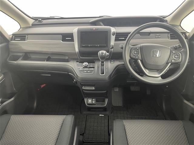 フリード Gブラックスタイル ワンオーナー 後席モニター 社外ナビ/フルセグTV バックカメラ ETC 前後ドラレコ レーダークルコン 衝突被害軽減ブレーキ レーンキープ アイドリングストップ 両側電動スライドドア シートヒーター(2枚目)