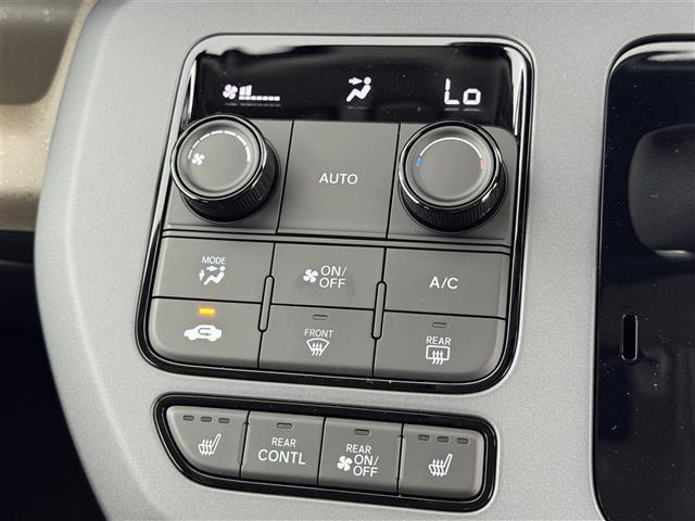 フリード ｅ：ＨＥＶエアー　ＥＸ　登録済未使用車　純正９型ナビ　バックカメラ　ホンダセンシング　レーダークルコン　衝突軽減ブレーキ　レーンキープ　アクセル踏み間違い防止　ＢＳＭ　両側電動スライドドア　シートヒーター　純正１５インチＡＷ（26枚目）