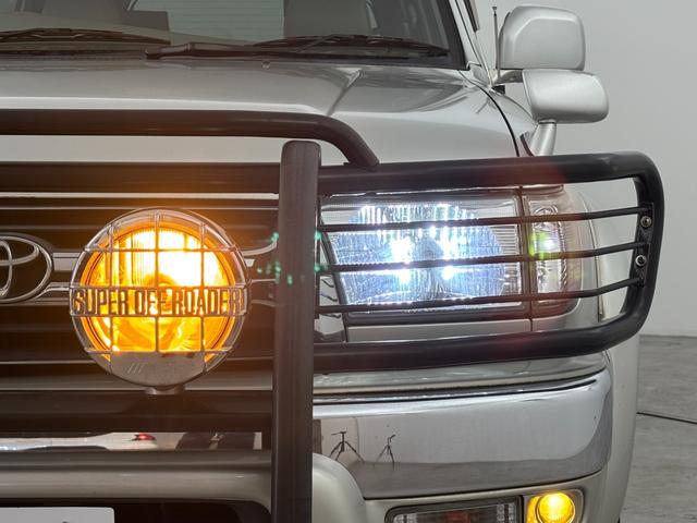 ハイラックスサーフ ＳＳＲ－Ｇ　社外ナビ　ＭＯＭＯステアリング　４ＷＤ　ＥＴＣ　ドラレコ　レーダー探知機　ＡＣ１００Ｖ　ＴＶキャンセラー　ルーフレール　背面タイヤ　牽引フック　ＩＰＦヘッドライト　フォグランプ　純正アルミホイール（40枚目）