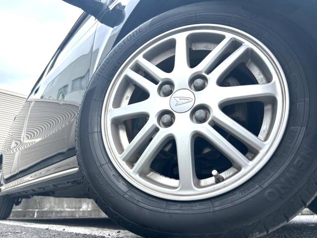 ミラカスタム Ｘ　禁煙車　純正オーディオ　オートエアコン　純正１４インチアルミホイール　フォグライト　ＣＤ再生　盗難防止装置　プライバシーガラス（10枚目）