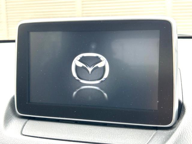デミオ ＸＤツーリング　衝突軽減装置　禁煙車　純正ナビ　バックカメラ　ＥＴＣ　Ｂｌｕｅｔｏｏｔｈ　スマートキー　シートヒーター　ＬＥＤヘッドライト　クルーズコントロール　革巻きステアリング　パドルシフト　純正１６インチアルミ（3枚目）