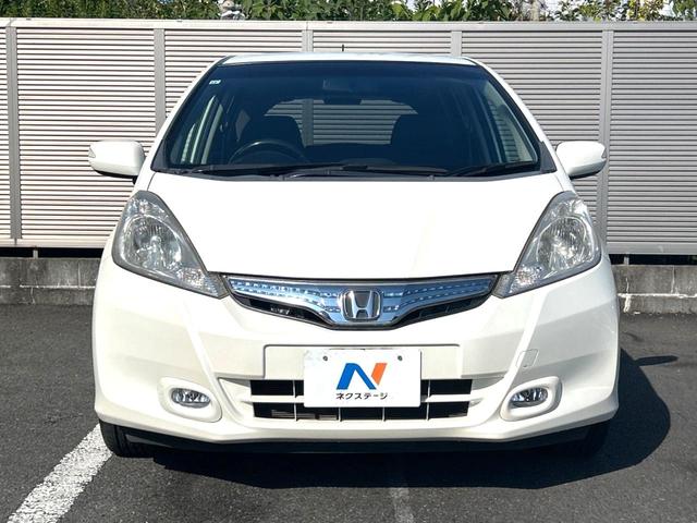 フィットハイブリッド スマートセレクション 禁煙車 ナビ ETC フルセグ Bluetooth スマートキー HIDヘッドライト LEDフォグライト クルーズコントロール 革巻きステアリング オートエアコン CD/DVD再生 オートライト(14枚目)