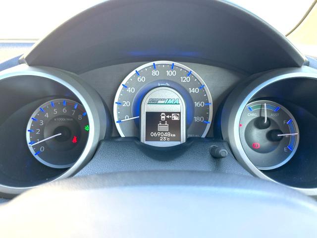 フィットハイブリッド スマートセレクション 禁煙車 ナビ ETC フルセグ Bluetooth スマートキー HIDヘッドライト LEDフォグライト クルーズコントロール 革巻きステアリング オートエアコン CD/DVD再生 オートライト(35枚目)