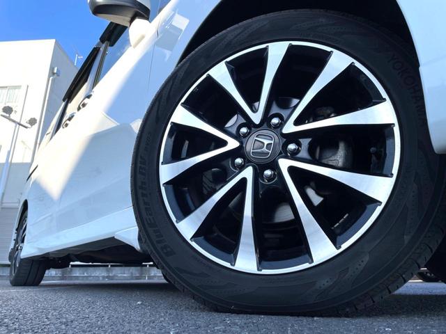 ステップワゴンスパーダ Z クールスピリット 両側電動スライドドア 禁煙車 純正ナビ バックカメラ ETC フルセグ ハーフレザーシート HIDヘッドライト クルーズコントロール 革巻きステアリング ステアリングスイッチ 純正17インチアルミ(14枚目)