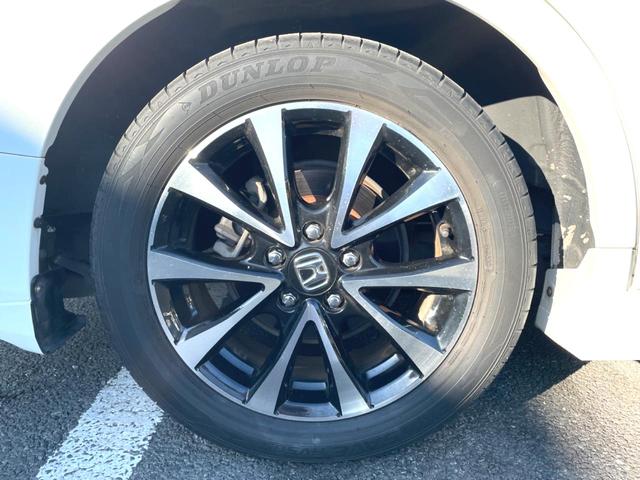 ステップワゴンスパーダ Z クールスピリット 両側電動スライドドア 禁煙車 純正ナビ バックカメラ ETC フルセグ ハーフレザーシート HIDヘッドライト クルーズコントロール 革巻きステアリング ステアリングスイッチ 純正17インチアルミ(30枚目)