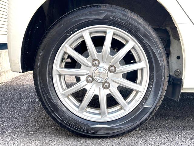 Ｎ－ＷＧＮ Ｇ・ターボパッケージ　ターボ　衝突軽減装置　禁煙車　純正ナビ　バックカメラ　ＥＴＣ　Ｂｌｕｅｔｏｏｔｈ　ドラレコ　スマートキー　ＨＩＤヘッドライト　純正１４インチアルミホイール　ＣＤ／ＤＶＤ再生　地デジ　プライバシーガラス（26枚目）