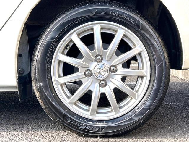 Ｎ－ＷＧＮ Ｇ・ターボパッケージ　ターボ　衝突軽減装置　禁煙車　純正ナビ　バックカメラ　ＥＴＣ　Ｂｌｕｅｔｏｏｔｈ　ドラレコ　スマートキー　ＨＩＤヘッドライト　純正１４インチアルミホイール　ＣＤ／ＤＶＤ再生　地デジ　プライバシーガラス（27枚目）