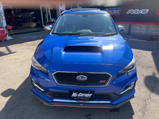 レヴォーグ ２．０ＳＴＩスポーツアイサイト　サンルーフ／ＳＴＩマフラー／ＳＴＩフロントアンダースポイラー／ＳＴＩエアロ／純正ナビ／Ｂｌｕｅｔｏｏｔｈ／ＴＶ／バックカメラ／純正１８インチアルミ／クルコン／パドルシフト／ＳＴＩタワーバー（4枚目）