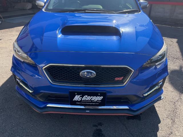 レヴォーグ ２．０ＳＴＩスポーツアイサイト　サンルーフ／ＳＴＩマフラー／ＳＴＩフロントアンダースポイラー／ＳＴＩエアロ／純正ナビ／Ｂｌｕｅｔｏｏｔｈ／ＴＶ／バックカメラ／純正１８インチアルミ／クルコン／パドルシフト／ＳＴＩタワーバー（19枚目）