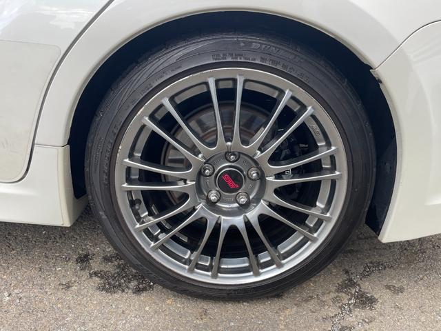 インプレッサ WRX STi フジツボA-Rマフラー/タン革シート/シートヒーター/STI BBS アルミホイール/SIドライブ/フルセグTVナビ/Bluetooth/純正リアスポイラー/ETC/プッシュスタート/スペアタイヤ(28枚目)