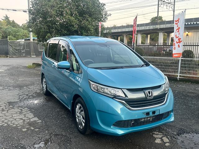 フリード Ｇ・ホンダセンシング　ＥＴＣ　ナビテレビ　バックカメラ　ＵＶカットパッケージ　ＨＩＤ　ヘッドライト　フロントフォグ　純正ホイール　ハーフレーザーシート（3枚目）