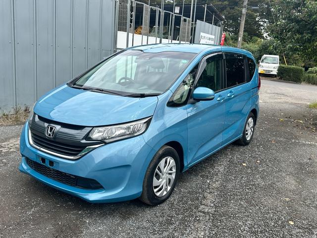 フリード Ｇ・ホンダセンシング　ＥＴＣ　ナビテレビ　バックカメラ　ＵＶカットパッケージ　ＨＩＤ　ヘッドライト　フロントフォグ　純正ホイール　ハーフレーザーシート（8枚目）