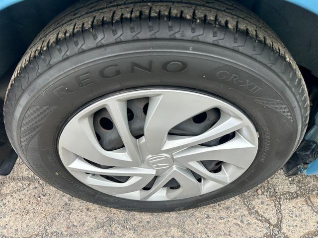 フリード Ｇ・ホンダセンシング　ＥＴＣ　ナビテレビ　バックカメラ　ＵＶカットパッケージ　ＨＩＤ　ヘッドライト　フロントフォグ　純正ホイール　ハーフレーザーシート（29枚目）