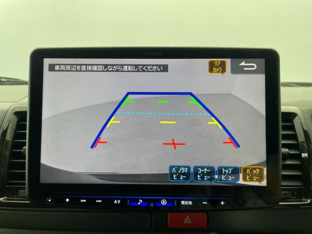ハイエースバン スーパーＧＬ　ダークプライムＩＩ　ＴＲＤエアロ　両側電動スライドドア　社外アルパイン１１型フローティングナビ　バックカメラ　　Ｂｌｕｅｔｏｏｔｈ　フルセグＴＶ　社外セキュリティ　クリアランスソナー　ホワイトレタータイヤ　ＥＴＣ（3枚目）