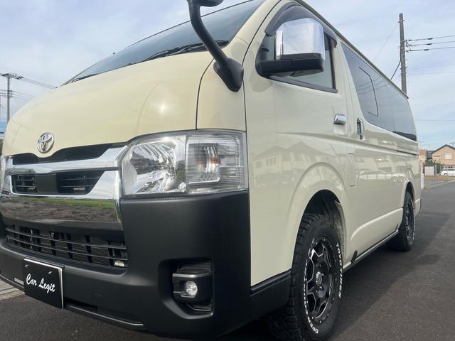 ハイエースバン ロングスーパーGL 車中泊 ビッグXナビ Bluetooth フリップダウンモニター 全方位モニター ウッド調ステアリング ウッド調インパネ 茶レザーシート ベッドキッド デジタルインナーミラー(8枚目)