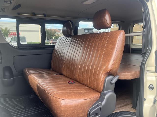 ハイエースバン ロングスーパーGL 車中泊 ビッグXナビ Bluetooth フリップダウンモニター 全方位モニター ウッド調ステアリング ウッド調インパネ 茶レザーシート ベッドキッド デジタルインナーミラー(14枚目)