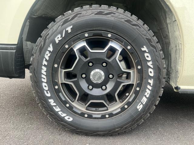 ハイエースバン ロングスーパーGL 車中泊 ビッグXナビ Bluetooth フリップダウンモニター 全方位モニター ウッド調ステアリング ウッド調インパネ 茶レザーシート ベッドキッド デジタルインナーミラー(40枚目)