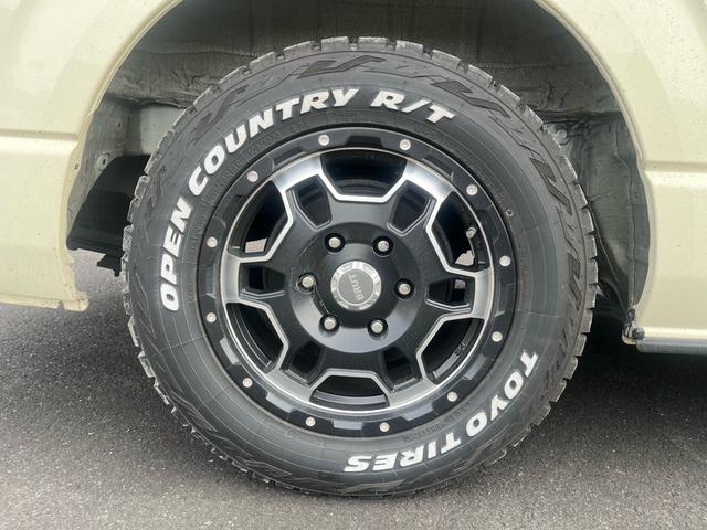 ハイエースバン ロングスーパーGL 車中泊 ビッグXナビ Bluetooth フリップダウンモニター 全方位モニター ウッド調ステアリング ウッド調インパネ 茶レザーシート ベッドキッド デジタルインナーミラー(42枚目)