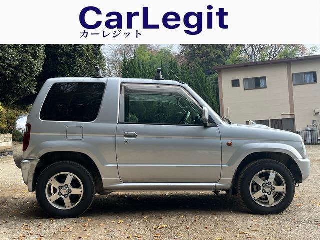 パジェロミニ アクティブフィールドエディション　距離５万キロ台　４ＷＤ　ワンオーナー　禁煙　ナビ　ＥＴＣ　　純正アルミ　ルーフキャリア　電動格納ミラー　エアコン（3枚目）