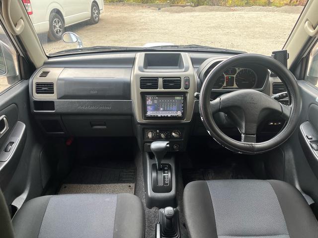 パジェロミニ アクティブフィールドエディション　距離５万キロ台　４ＷＤ　ワンオーナー　禁煙　ナビ　ＥＴＣ　　純正アルミ　ルーフキャリア　電動格納ミラー　エアコン（13枚目）