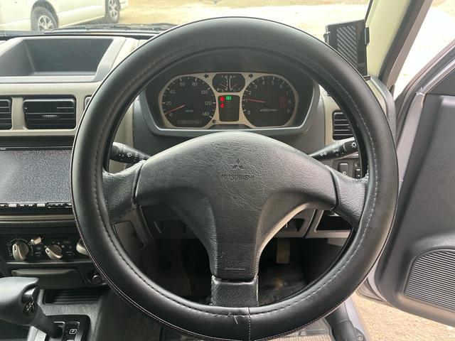 パジェロミニ アクティブフィールドエディション　距離５万キロ台　４ＷＤ　ワンオーナー　禁煙　ナビ　ＥＴＣ　　純正アルミ　ルーフキャリア　電動格納ミラー　エアコン（25枚目）