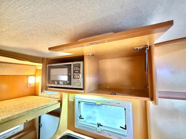 カムロード  バンテック コルドバンクス ディーゼル 8名乗車 タイベル交換済 FFヒータ- 新品冷蔵庫 ランチョ製前後ショック リアクーラー サイドオーニング 1500Wインバーター 電子レンジ テレビ(52枚目)