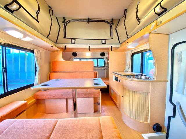 タウンエーストラック 　バンショップミカミ　Ｄテントむし　ポップアップルーフ　６名乗車　ＦＦヒーター　１２Ｖ電子レンジ　冷蔵庫　サイドオーニング　走行充電　外部充電　ギャレー　１０Ｌ給排水ポリタンク　ＥＴＣ　ナビ（2枚目）
