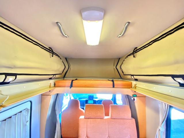 タウンエーストラック 　バンショップミカミ　Ｄテントむし　ポップアップルーフ　６名乗車　ＦＦヒーター　１２Ｖ電子レンジ　冷蔵庫　サイドオーニング　走行充電　外部充電　ギャレー　１０Ｌ給排水ポリタンク　ＥＴＣ　ナビ（61枚目）