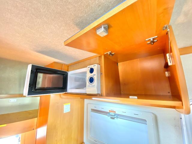 タウンエーストラック 　バンテック　アトム４０５　７名乗車　レンタアップ　ＦＦヒーター　ツインサブ　１５００Ｗインバータ　ルーフベント　サイドオーニング　サイクルキャリア　冷蔵庫　電子レンジ　マルチルーム　外部充電　走行充電（71枚目）