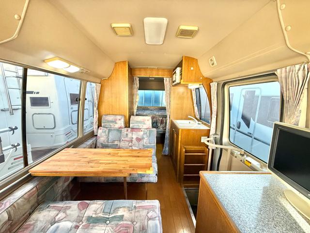 コースター 　キャンピングカーハタナカ製　オリジナルキャンパー　１０名乗車　ＮＯｘ・ＰＭ適合車　バスコン　リチウムイオンバッテリー　サイドオーニング　３０００Ｗインバーター　電子レンジ　テレビ　１２Ｖ冷蔵庫（2枚目）