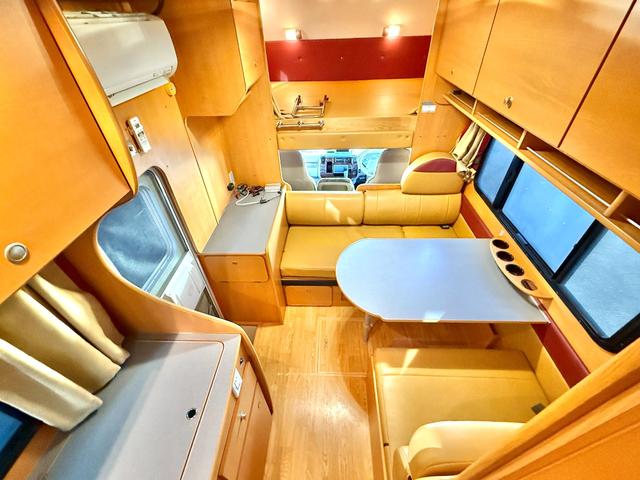 カムロード キャンピングワークス オルビス ユーロ ディーゼル レンタアップ車 タイベル交換済 家庭用エアコン FFヒータ- リアヒーター トリプルサブバッテリー サイドオーニング マルチルーム 電子レンジ(3枚目)